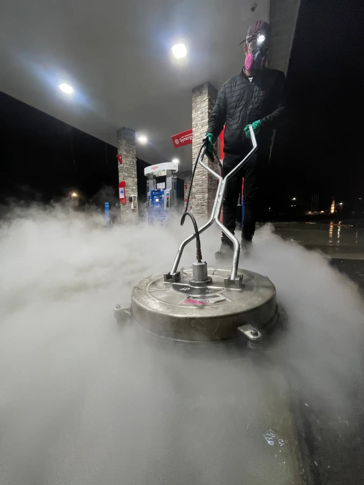 Concrete surface power washing at a Boise gas station