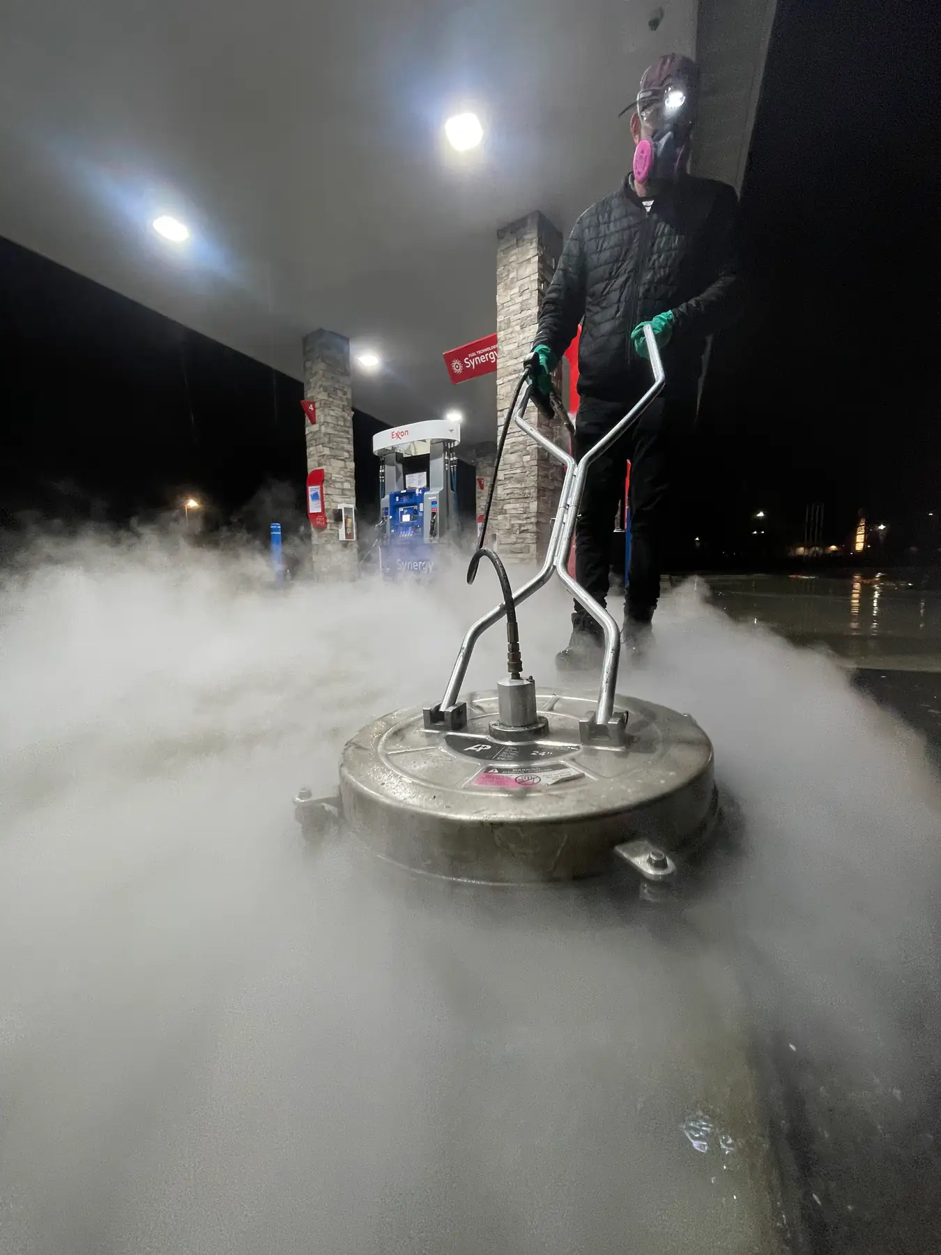 Concrete surface power washing at a Boise gas station