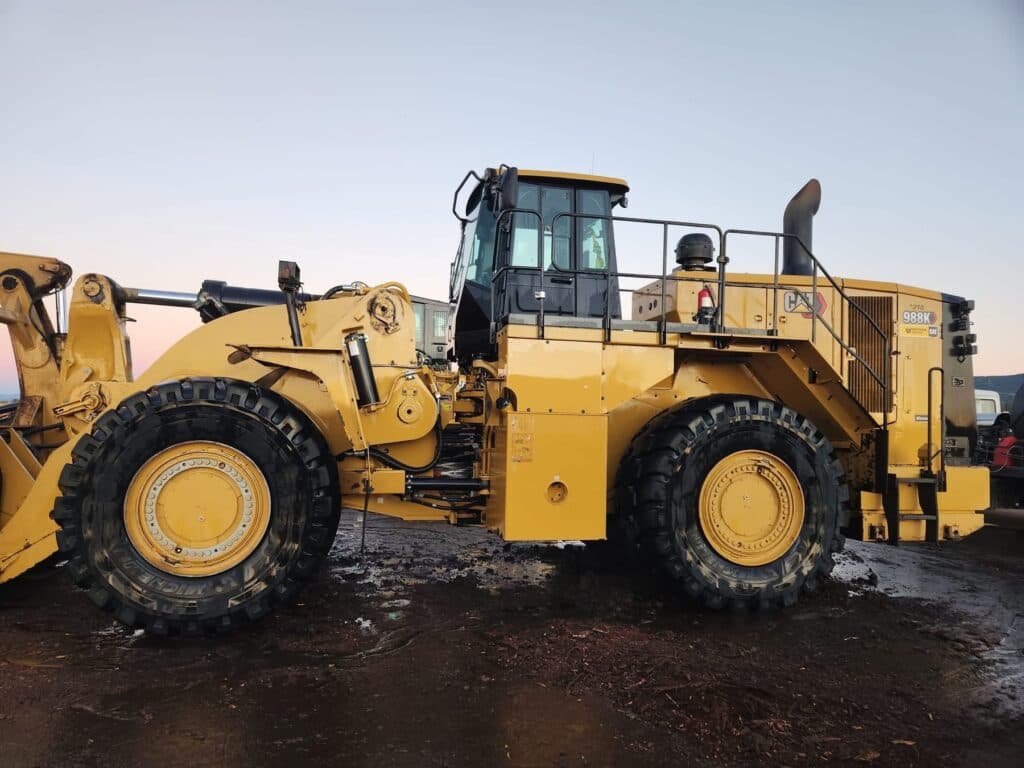 CAT 988K wheel loader cleaned — construction equipment pressure washing result