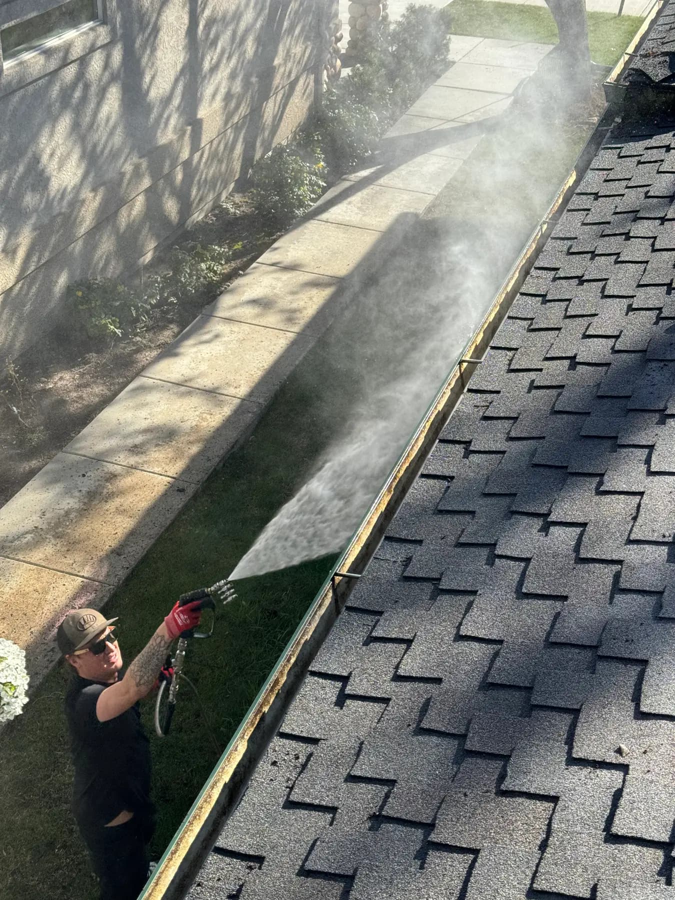 Gutter cleaning cost factors — debris removal on a Boise-area home