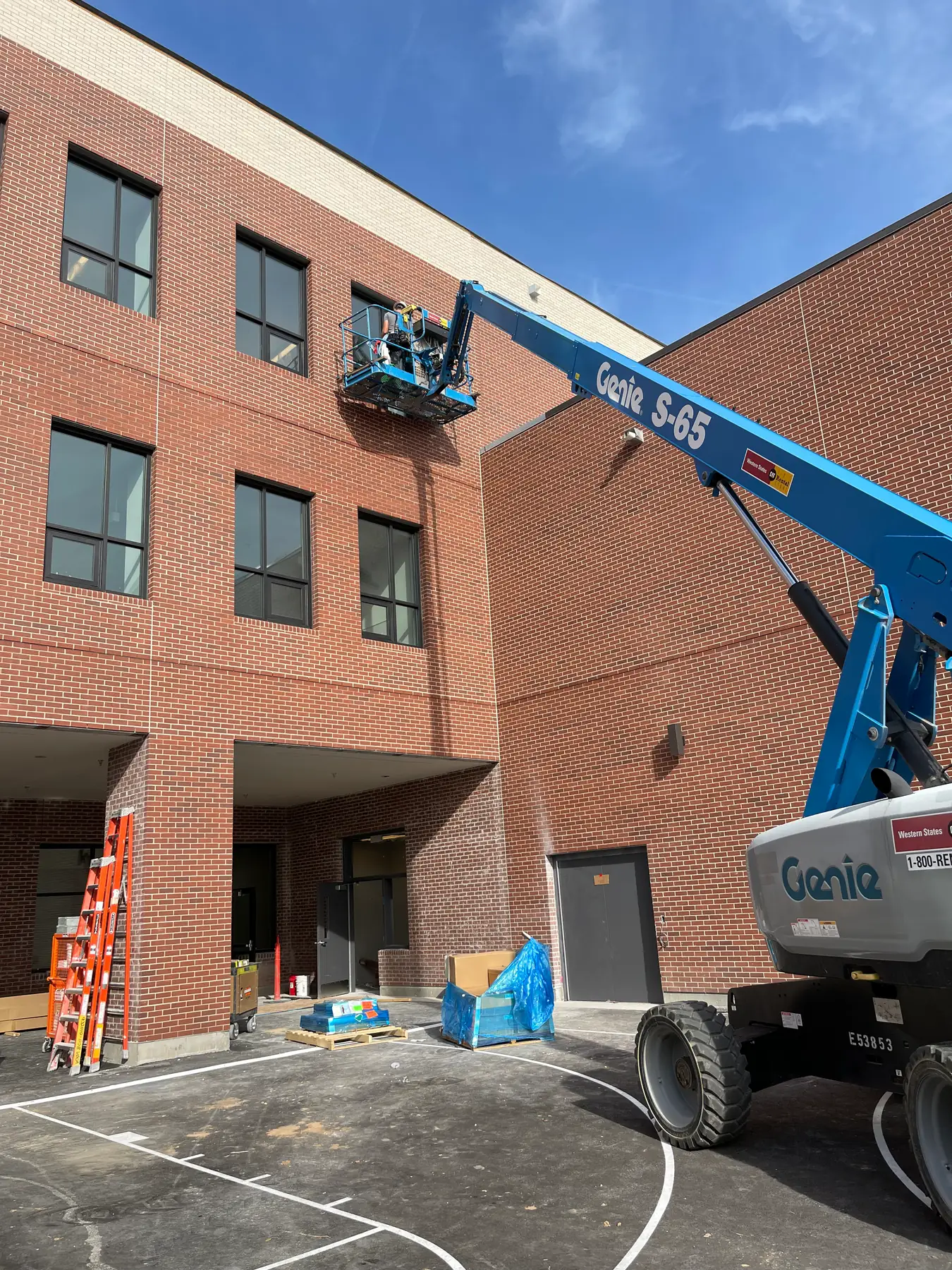 Multi-story commercial window cleaning with lift access